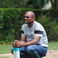 Man planning his next jukskei throw