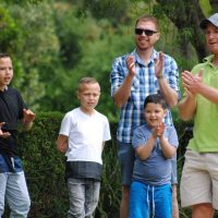 Spectators cheering for their jukskei team