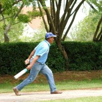 Man throwing jukskei pin